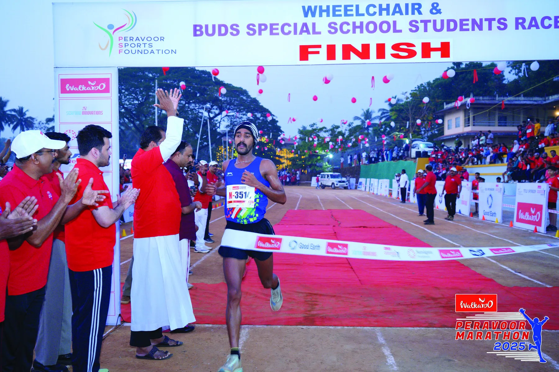 Runner finishing the Peravoor Marathon 2025