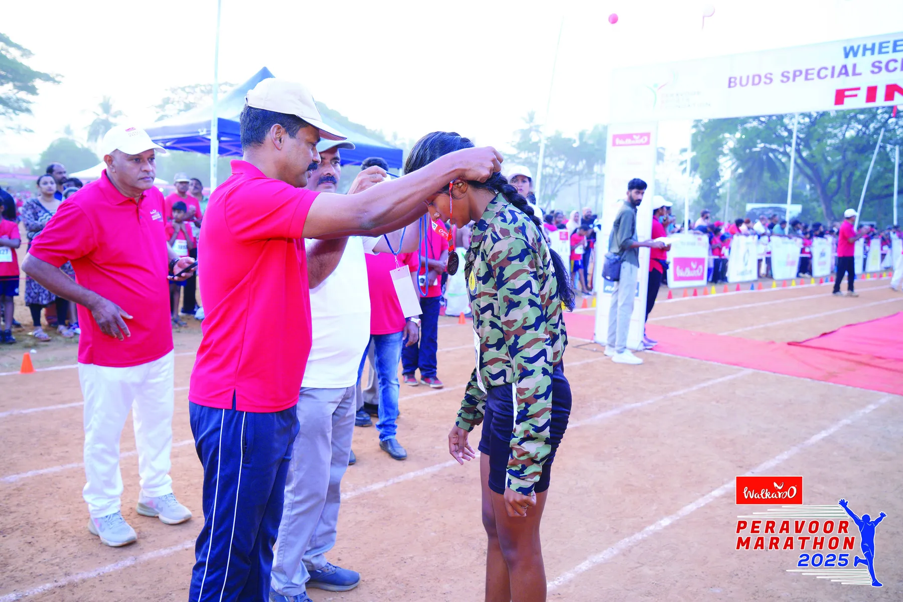 Peravoor Marathon 2025 runners on the course